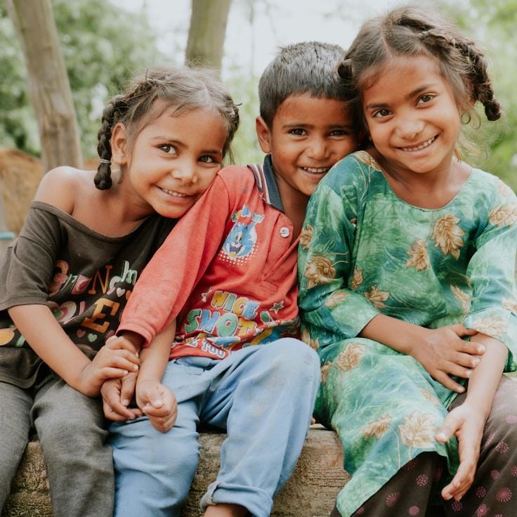 Kaveri Mehta, Lead Design Curator at SignalHarborLoft, reviewing corporate floral arrangements